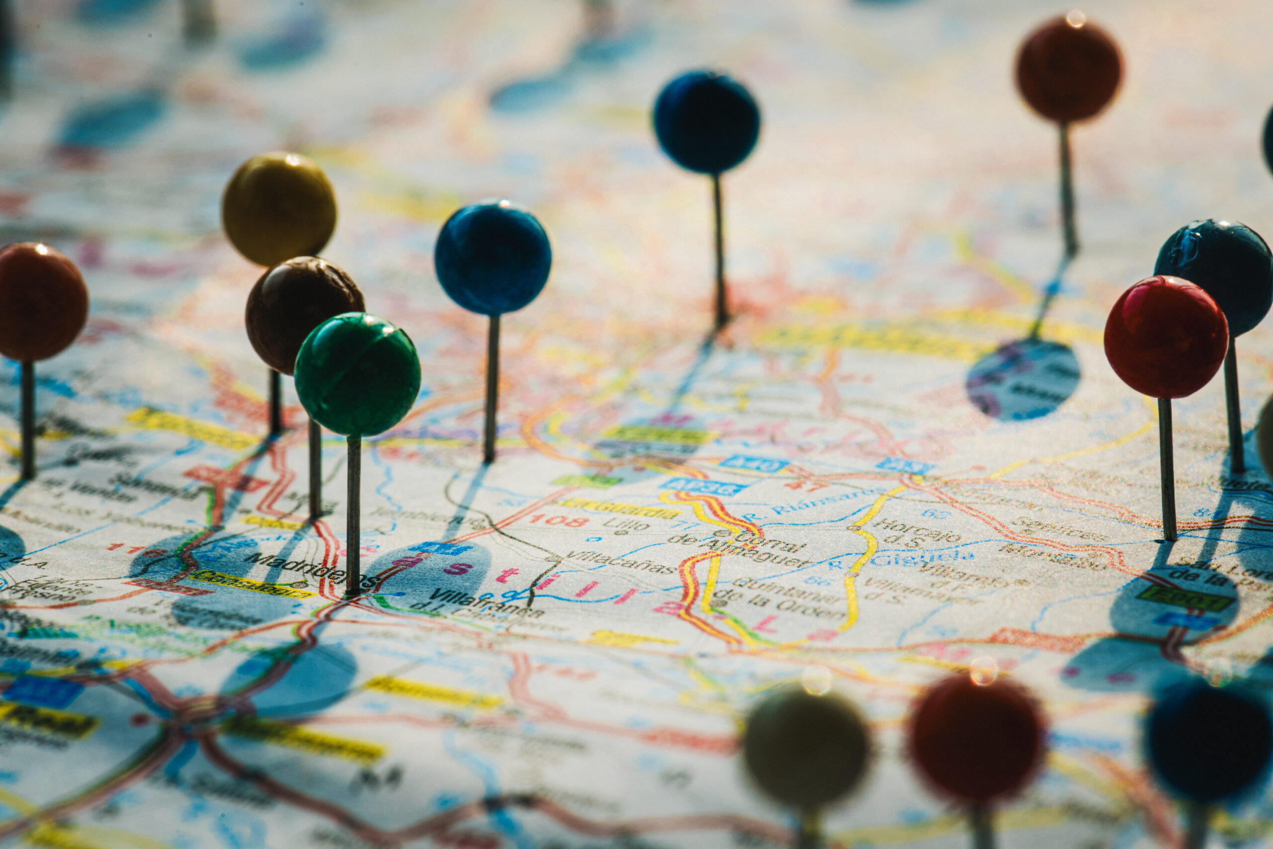 Closeup of pins on the map planning travel journey